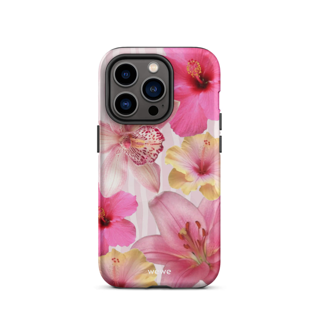 Custom iPhone case 14 pro with a tropical floral pattern of pink and yellow hibiscus flowers and lilies on a striped background.