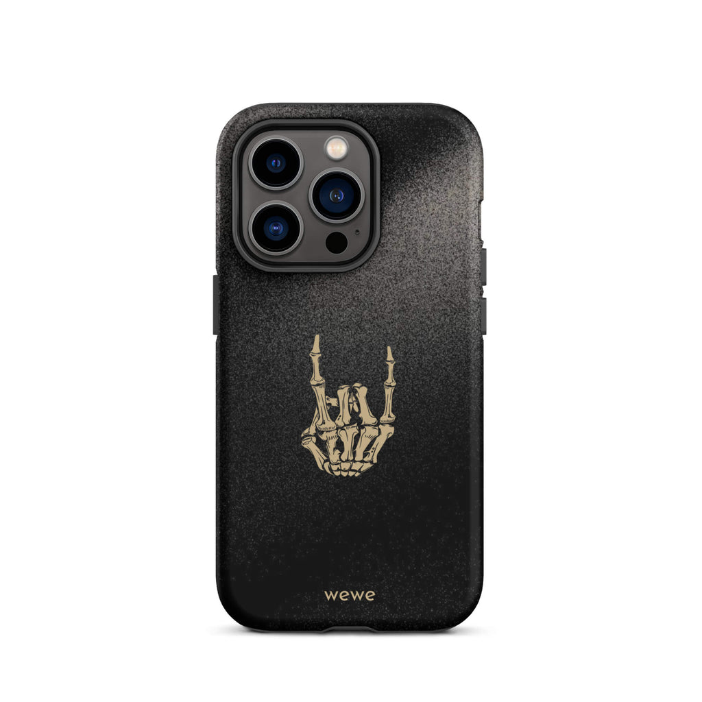 Custom iPhone case 14 pro with a black, gritty background and a gold skeleton hand making the "rock on" gesture.