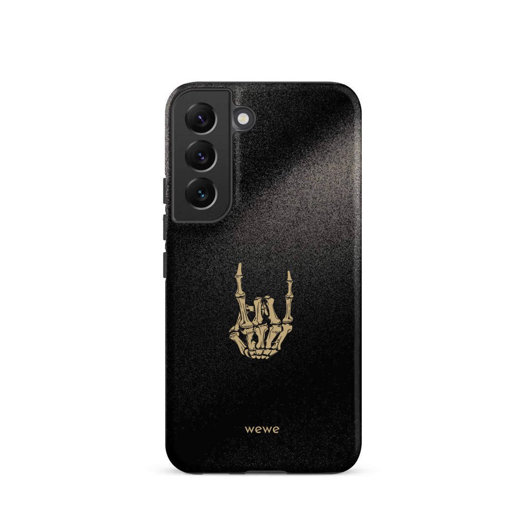 Custom samsunng galaxy s22 Phone case with a black, gritty background and a gold skeleton hand making the "rock on" gesture.