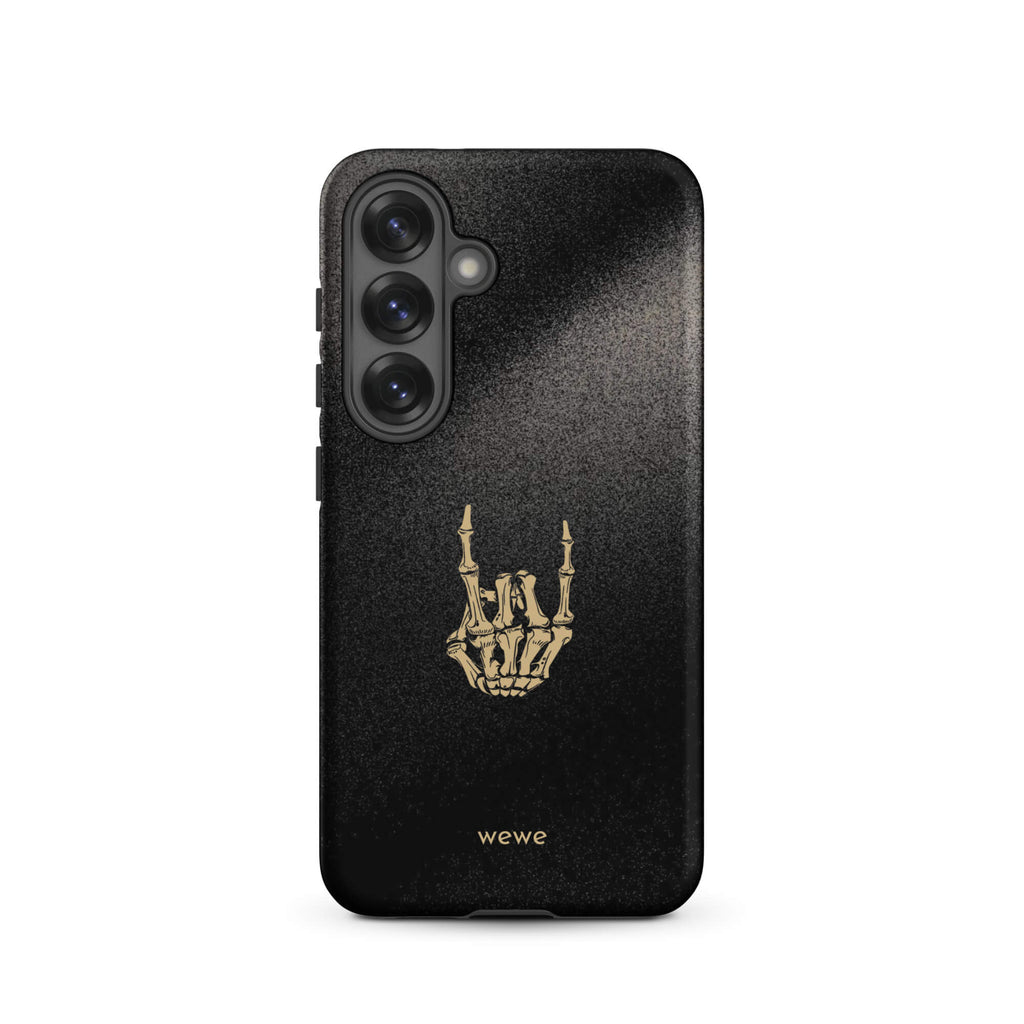 Custom samsunng galaxy s25 Phone case with a black, gritty background and a gold skeleton hand making the "rock on" gesture.