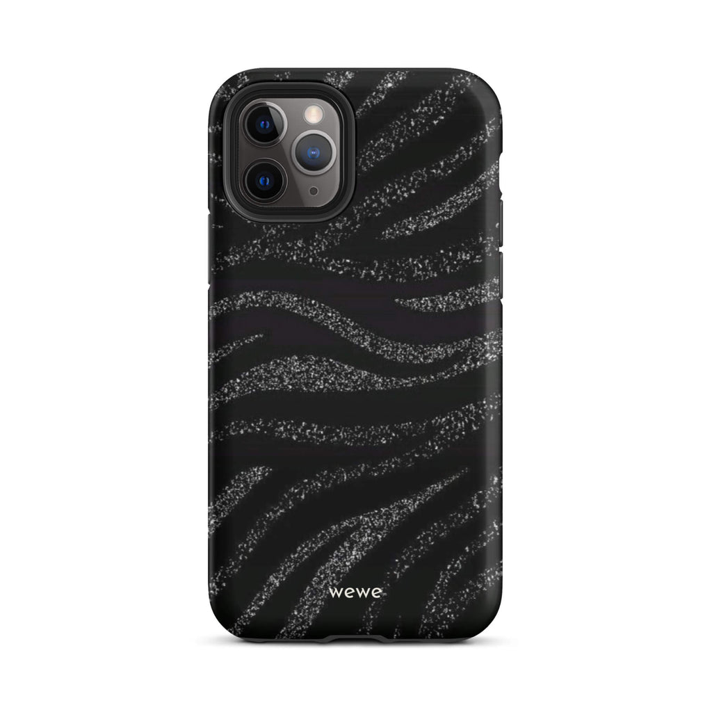 Custom iPhone case 11 pro with a black background and a sparkly silver glitter wavy zebra stripe pattern.