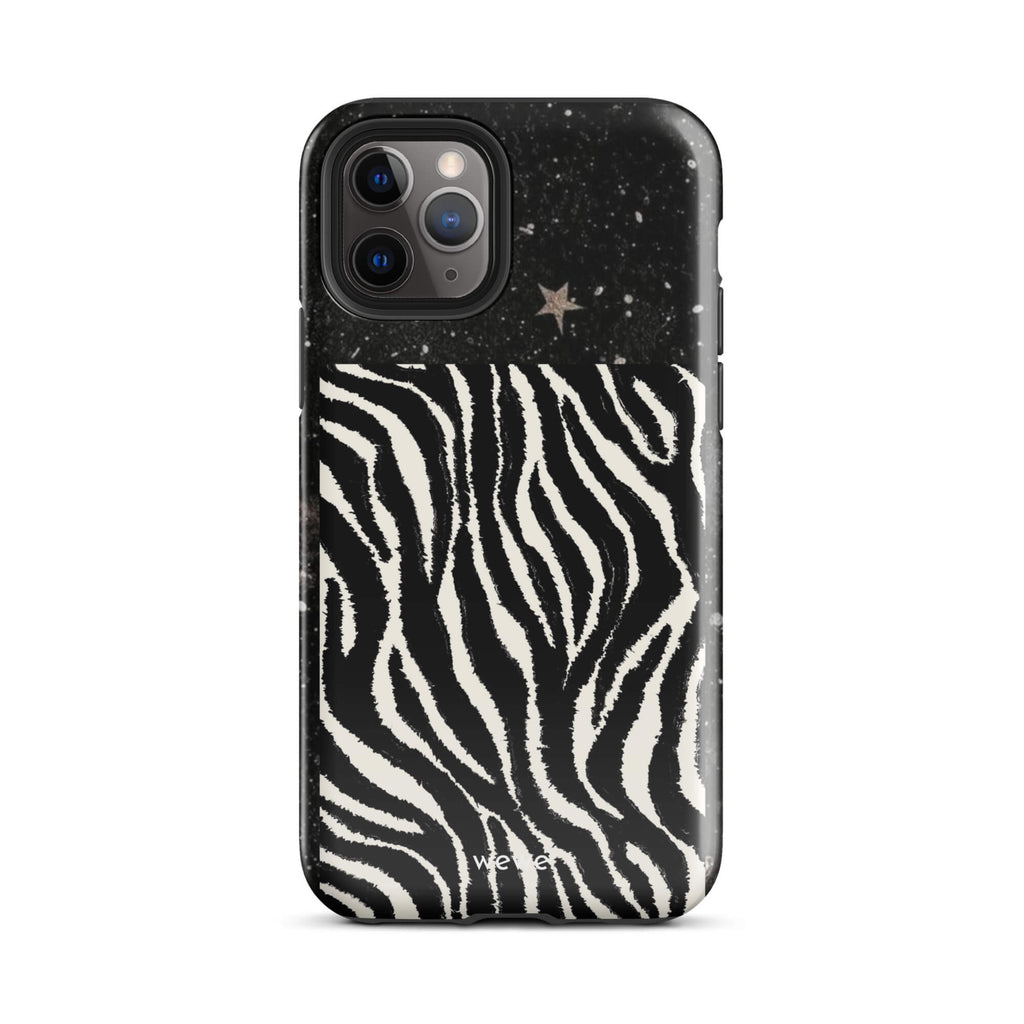 Custom iPhone case 11 pro with a black, glittery cosmic/galaxy top half with stars, and a bold black and white zebra stripe pattern on the bottom half.