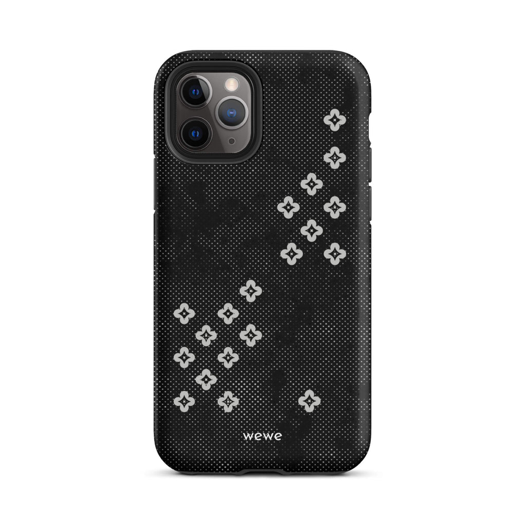 Custom iPhone case 11 pro with a  black lace background with white plum-style crosses.