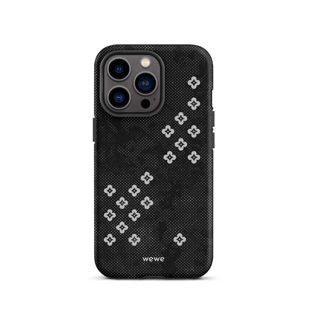 Custom iPhone case 13 pro with a  black lace background with white plum-style crosses.