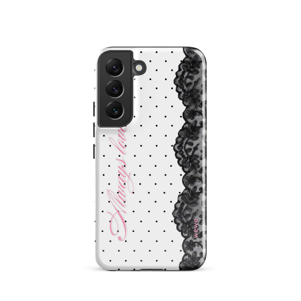 White phone case with small black polka dots, black floral lace border and pastel pink cursive lettering