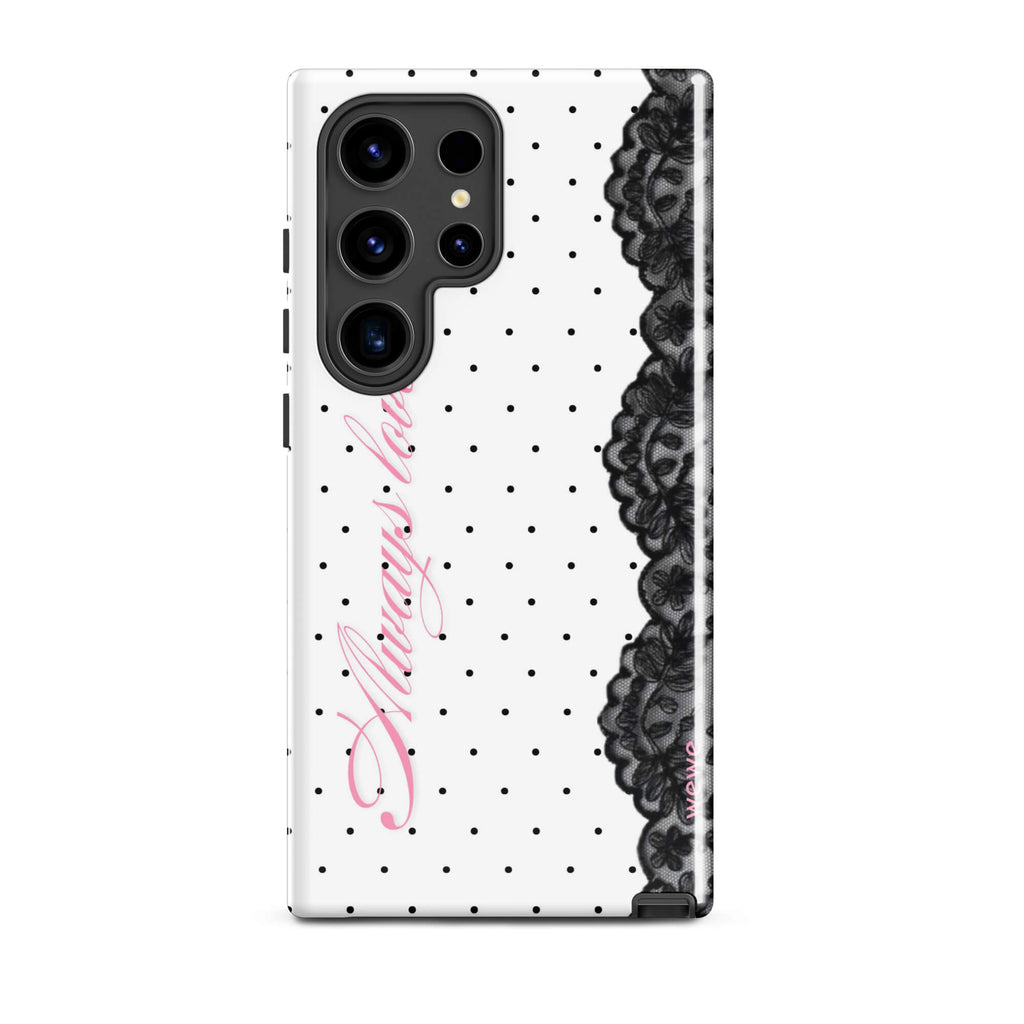 White phone case with small black polka dots, black floral lace border and pastel pink cursive lettering