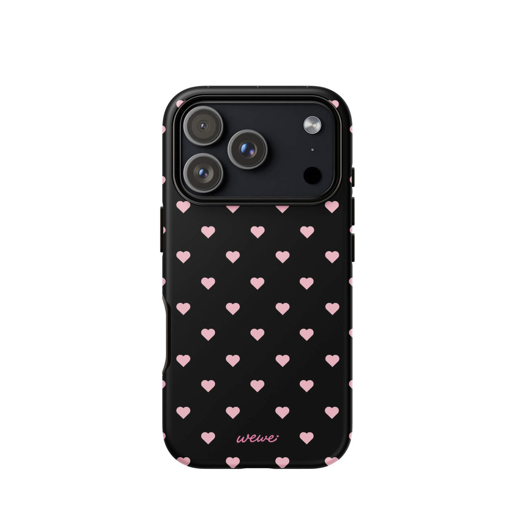 Black iPhone case with evenly spaced soft-pink mini hearts
