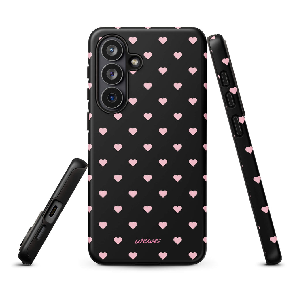Black iPhone case with evenly spaced soft-pink mini hearts