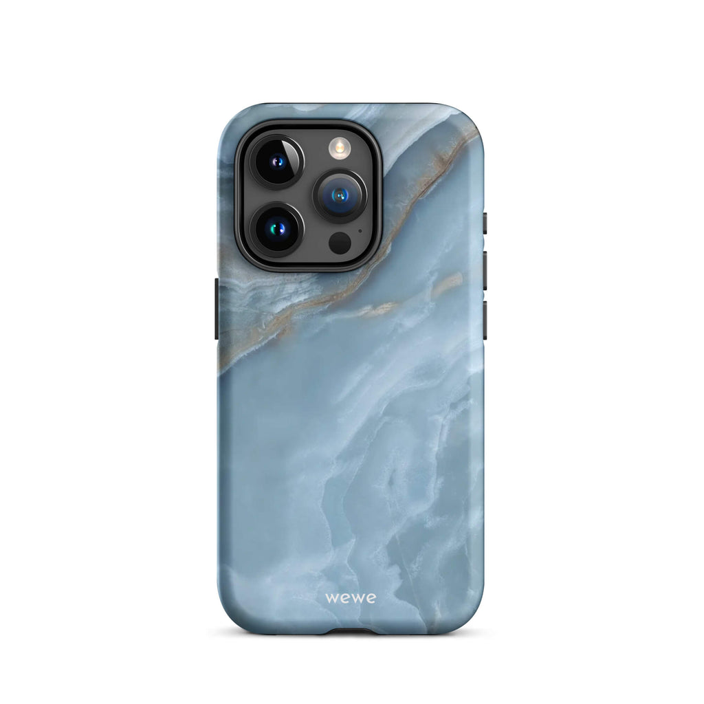 Custom iPhone case 15 pro with a close-up image of a blue, white, and gold marble-like agate slice.