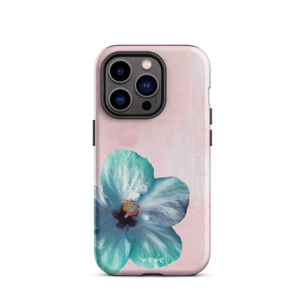 Custom iPhone case 14 pro max with a photo of a blue hibiscus flower with a green center on a soft pink painted 