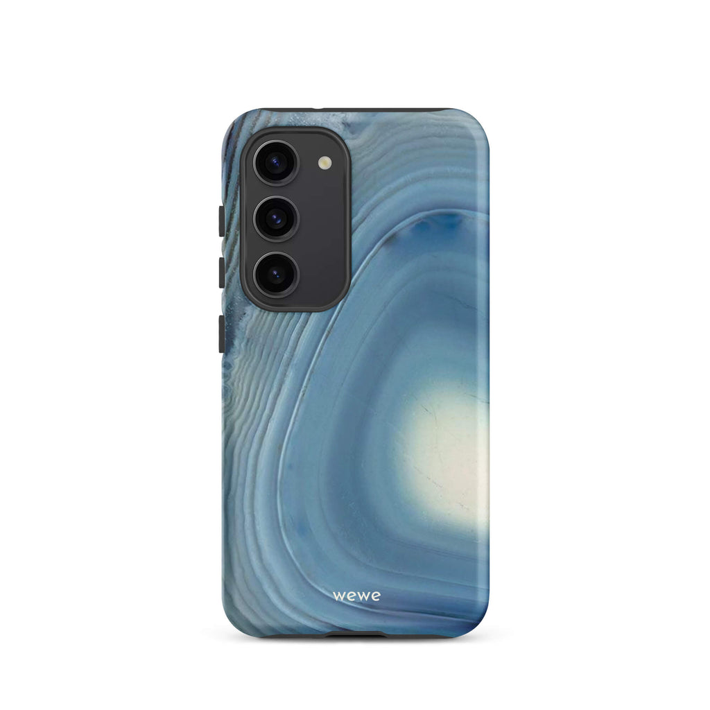 Custom samsung galaxy s23 Phone case with a  close-up image of a blue and white geode or agate slice with swirling patterns.