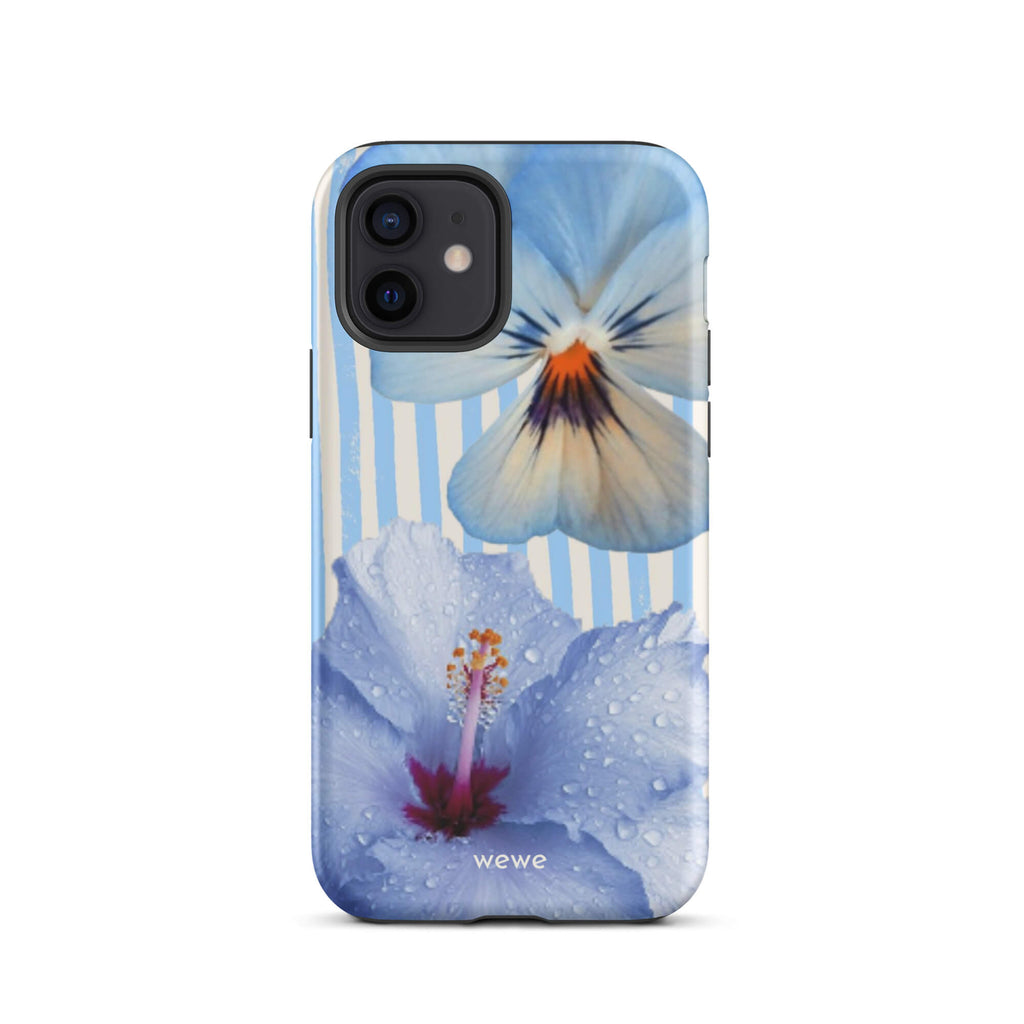 Custom iPhone case 12 with a photo of a blue hibiscus flower with water droplets and a white pansy on a striped background.