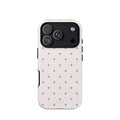 Blush pink iPhone case with evenly spaced bright green mini polka dots