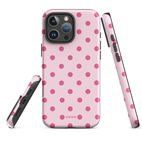 Blush-pink iPhone case with evenly spaced raspberry-pink polka dots