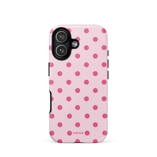 Blush-pink iPhone case with evenly spaced raspberry-pink polka dots