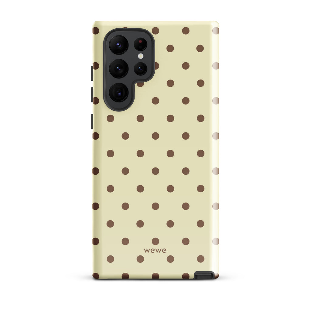 Butter yellow iPhone case with evenly spaced cocoa-brown mini polka dots