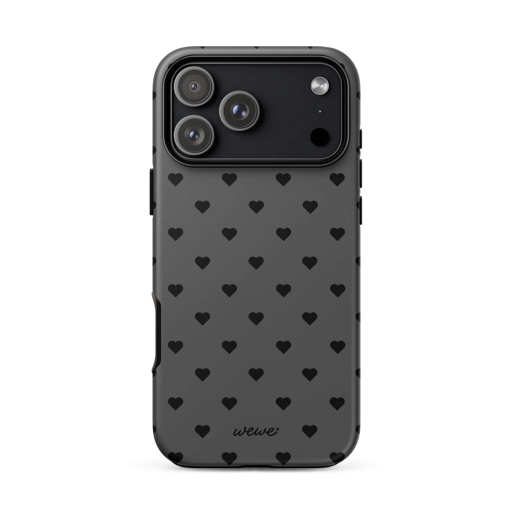 Charcoal-gray iPhone case with evenly spaced black mini hearts
