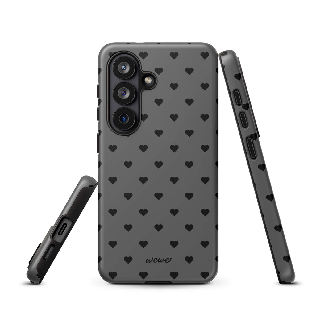 Charcoal-gray iPhone case with evenly spaced black mini hearts