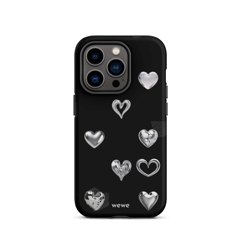 Custom iPhone case 14 pro with a black background and shiny silver chrome heart charms in various designs, including a cracked heart.