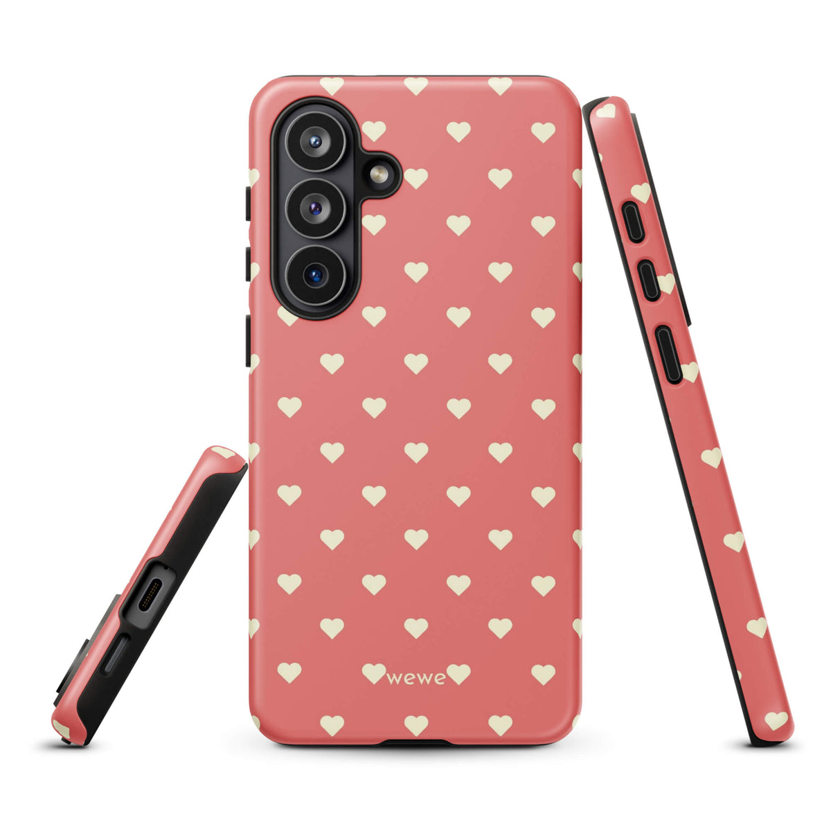 Coral-pink iPhone case with evenly spaced soft-cream mini hearts
