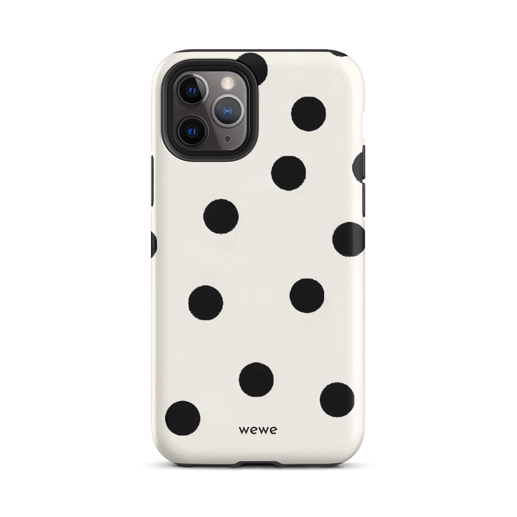 Custom iPhone case 11 pro with a  classic black polka dot pattern on a clean white background.