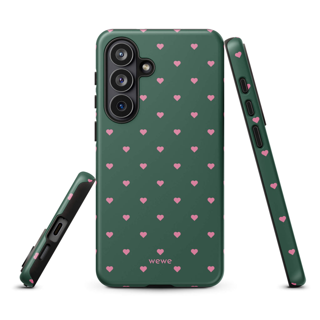 Deep forest-green iPhone case with evenly spaced vivid-pink mini hearts