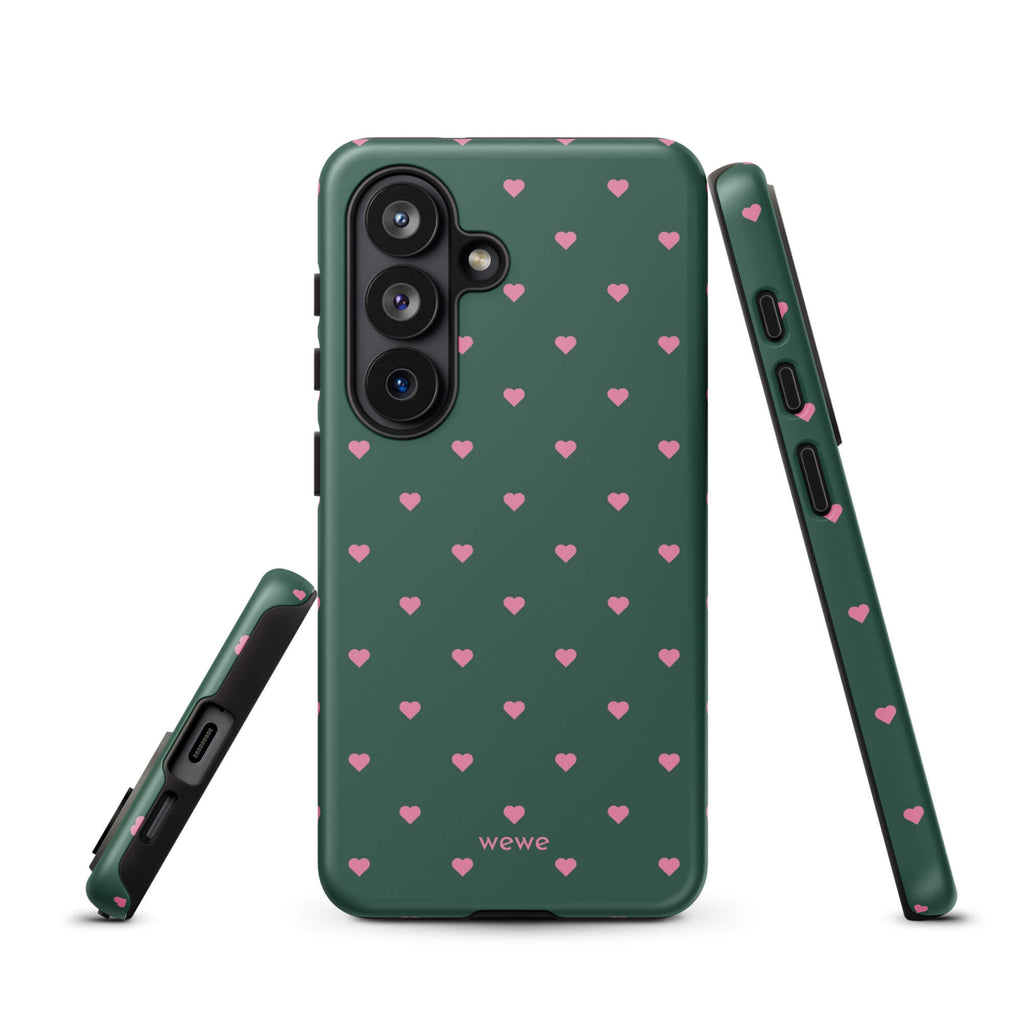 Deep forest-green iPhone case with evenly spaced vivid-pink mini hearts