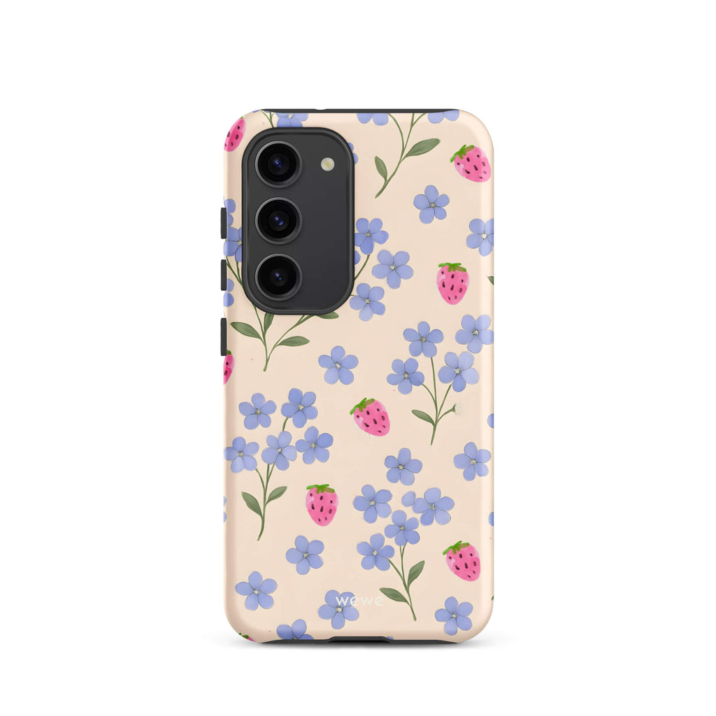 Custom samsung galaxy s23 Phone case with a cute and whimsical pattern of watercolor blue forget-me-not flowers and pink strawberries on a light cream background.