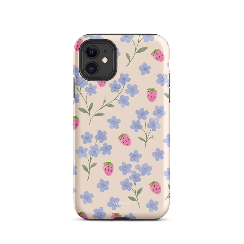 Custom iPhone case 11 with a cute and whimsical pattern of watercolor blue forget-me-not flowers and pink strawberries on a light cream background.