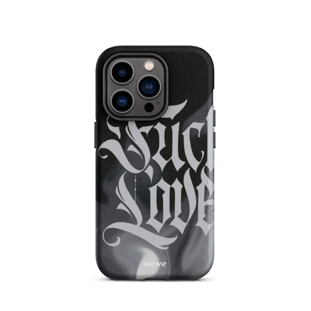 Custom iPhone case 14 pro with a black and gray smoke-like background and "Fake Love" written in white gothic script.