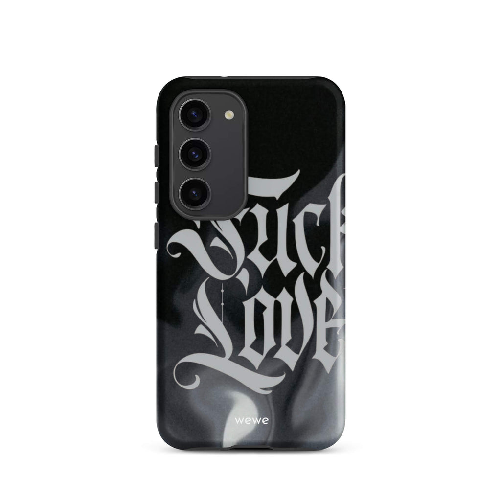 Custom samsung galaxy s23 Phone case with a black and gray smoke-like background and "Fake Love" written in white gothic script.