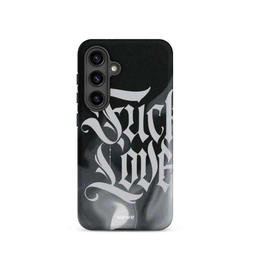 Custom samsung galaxy s24 Phone case with a black and gray smoke-like background and "Fake Love" written in white gothic script.