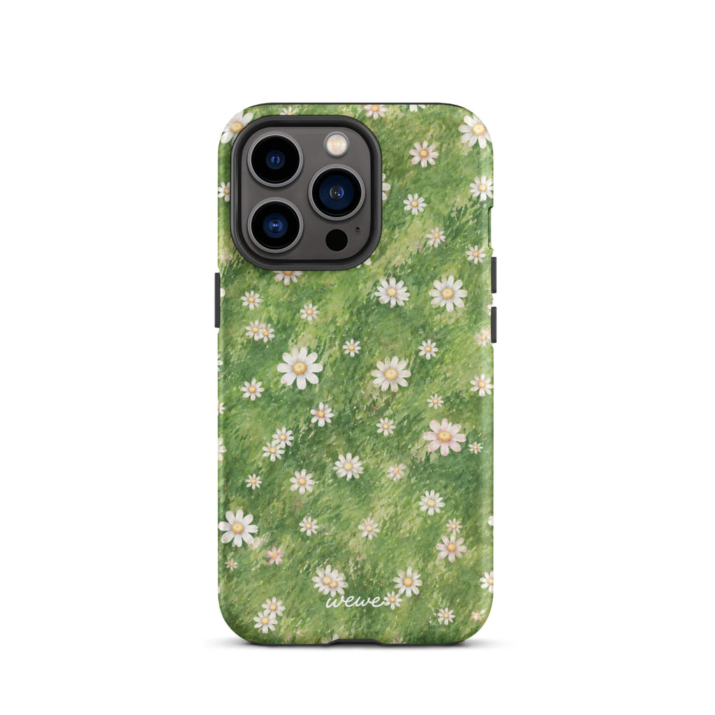 Green painterly meadow phone case covered with scattered white daisies and soft yellow flower centers