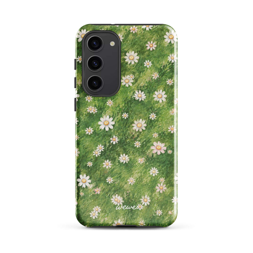 Green painterly meadow phone case covered with scattered white daisies and soft yellow flower centers