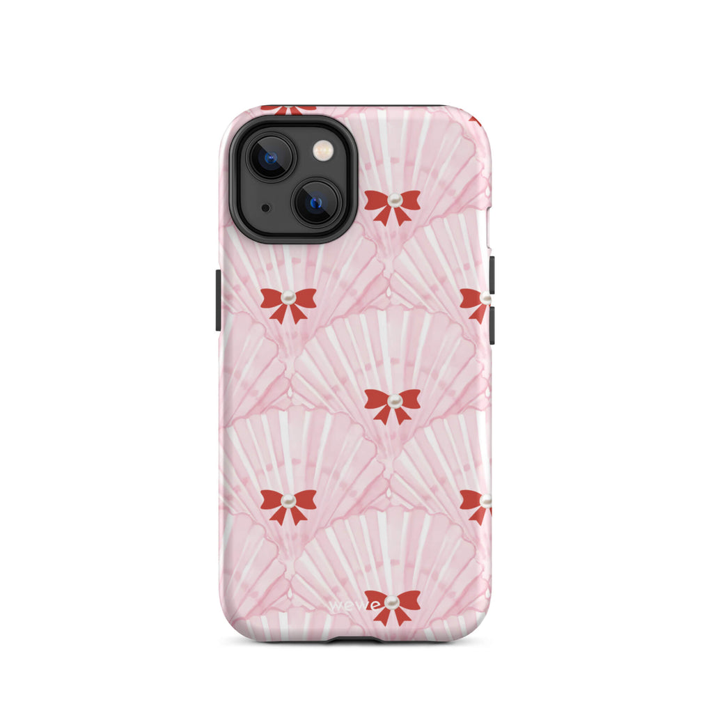 Custom iPhone case 14 with a cute and whimsical pattern of watercolor pink and white seashells with red bows and pearls.