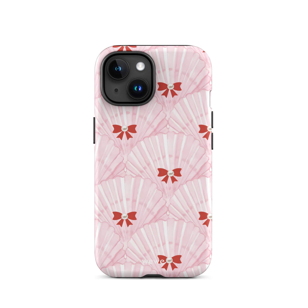 Custom iPhone case 15 with a cute and whimsical pattern of watercolor pink and white seashells with red bows and pearls.