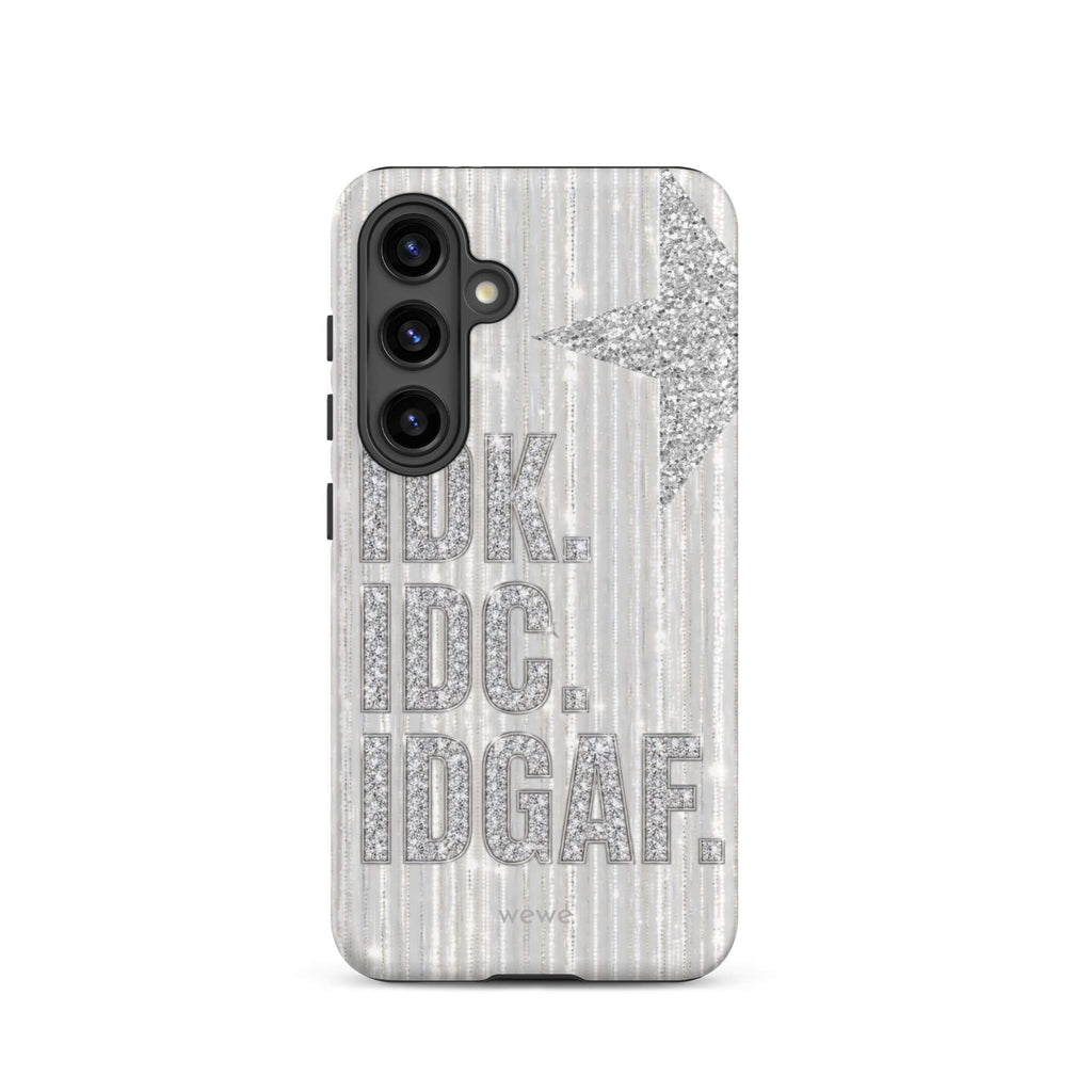 Silver and white iPhone case with stacked IDK. IDC. IDGAF. rhinestone-effect lettering