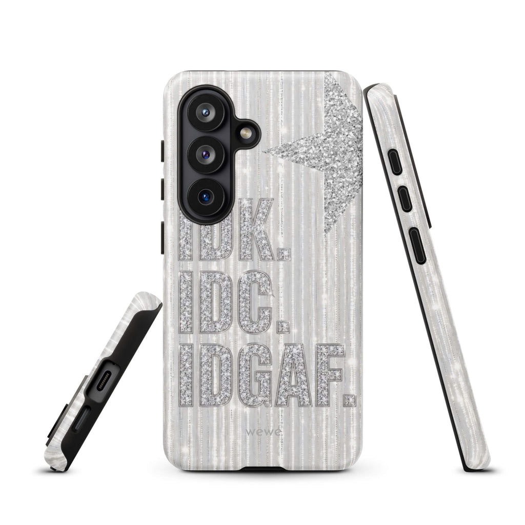 Silver and white iPhone case with stacked IDK. IDC. IDGAF. rhinestone-effect lettering