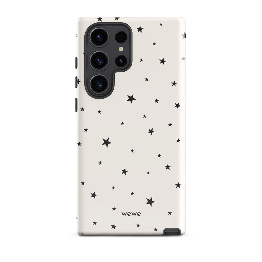 Warm ivory iPhone case with scattered black five-point stars in mixed sizes