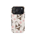 Leopard Bikini Beach Phone Case featuring brown animal-print bikinis, blush pink seashells and starfish on a cream background