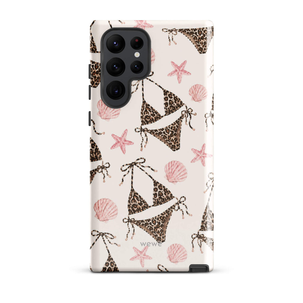 Leopard Bikini Beach Phone Case featuring brown animal-print bikinis, blush pink seashells and starfish on a cream background