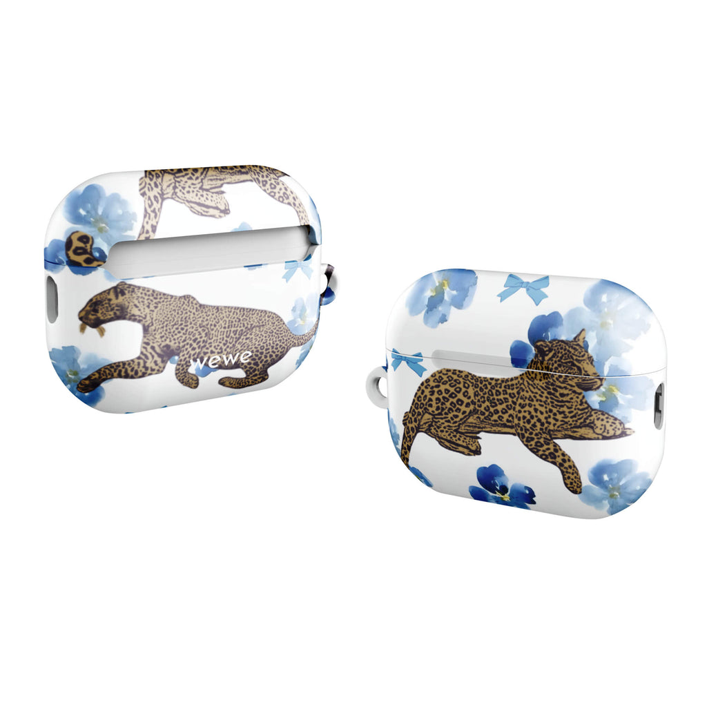 Custom AirPods case pro gen2 with a cute pattern of leopard print cheetahs, blue pansies, and small ribbons on a white background.