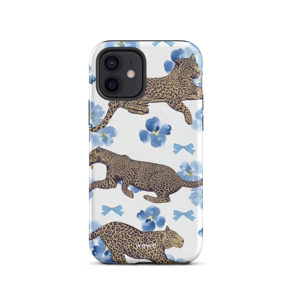 Custom iPhone case 12 with a cute pattern of leopard print cheetahs, blue pansies, and small ribbons on a white background.