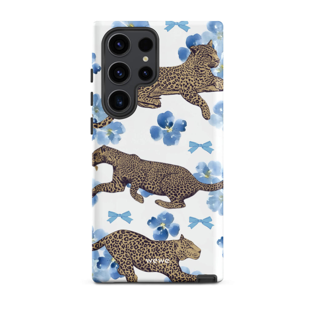 Custom samsung galaxy s23 Phone case with a cute pattern of leopard print cheetahs, blue pansies, and small ribbons on a white background.
