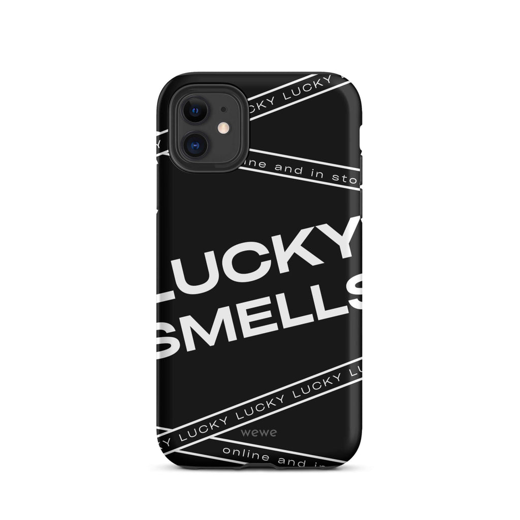 Custom iPhone case 11 with a black background and white typography that says "LUCKY SMELLS" and "online and in sto".