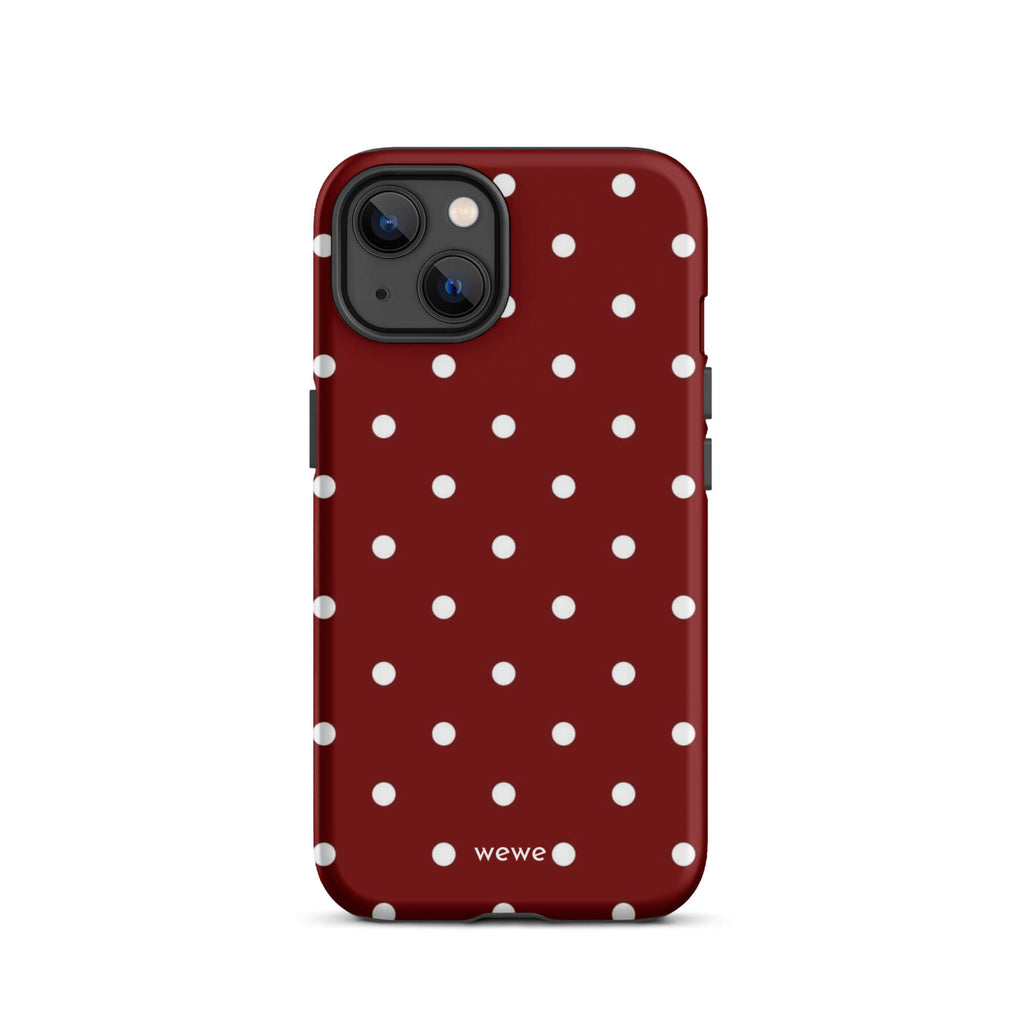 Custom iPhone case 13 with a maroon red background and a pattern of small white polka dots.