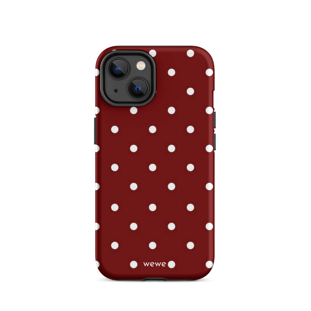 Custom iPhone case 14 with a maroon red background and a pattern of small white polka dots.