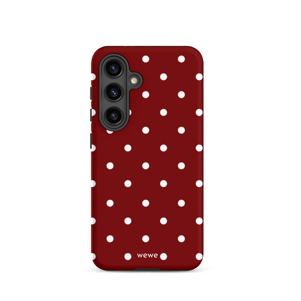Custom samsung galaxy s24 Phone case with a maroon red background and a pattern of small white polka dots.
