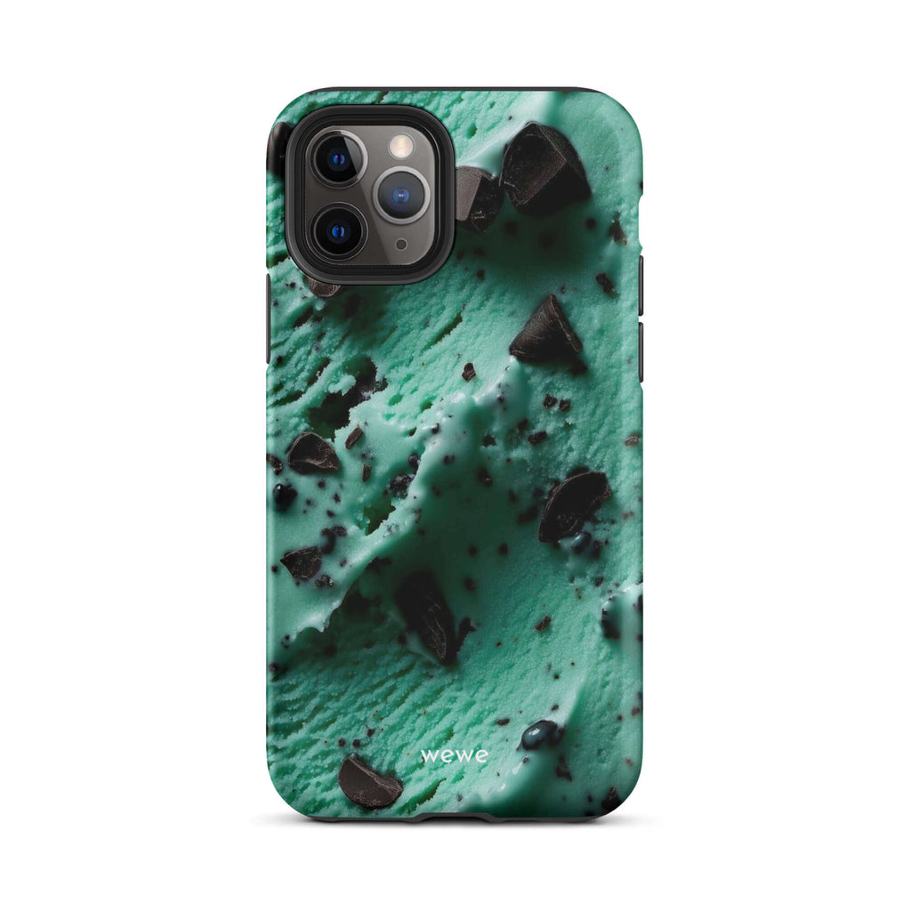 Custom iPhone case 11 pro with a close-up, macro photo of a textured, light green mint ice cream with dark chocolate chips.