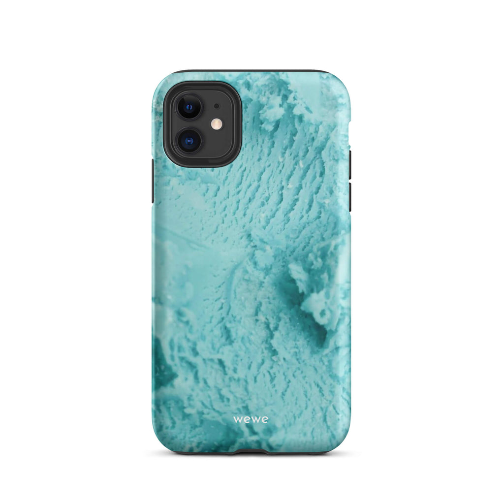 Custom iPhone case 11 with a  close-up, macro photo of a mint green, frothy texture, resembling ice cream or foam.